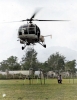 06.c  Helicopter obstacle race<br/>Brian Fawcett hanging on to the poles