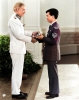 01.c Sgt West Wu Receives Governor's Commendation<br/>from HE Sir David Wilson..